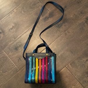 Anya Hindmarch metallic rainbow and clear tote